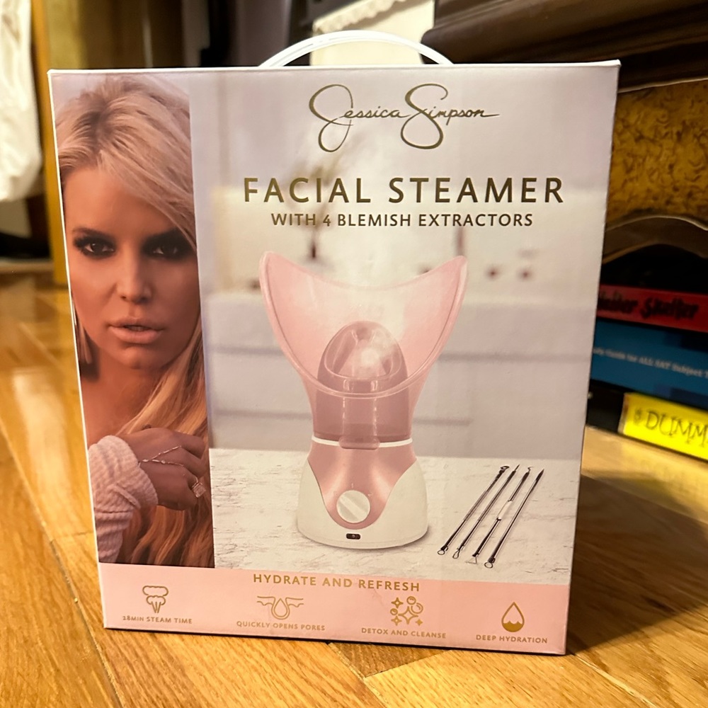 Facial steamer with blemish extractors